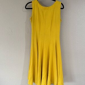 Bright yellow stretch dress with fluttery skirt